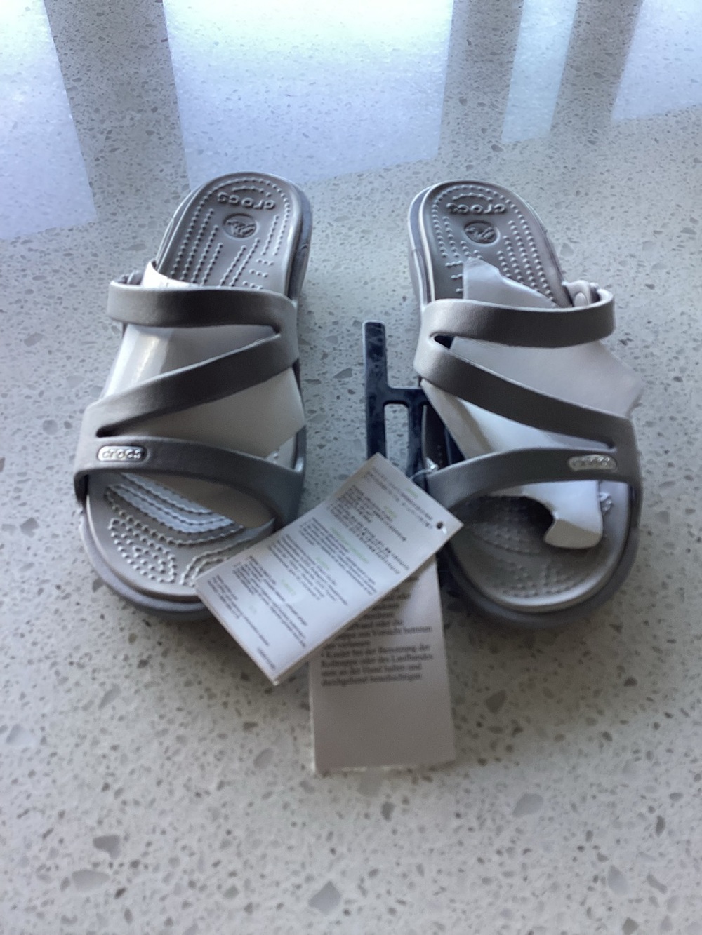 Crocs Women’s Silver Slide Sandals - Comfortable Strappy Footbed. NWT.